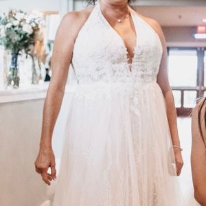 Halter wedding dress , illusion bodice, plunging neck line and sexy side slit.